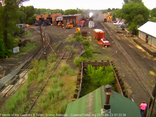 6.23.16 now shoves the spreader and caboose back where they started.jpg