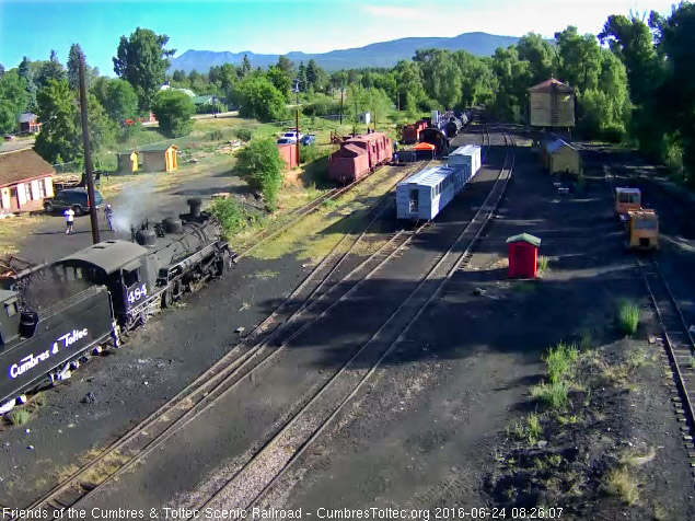 6.24.16 Coal dust flies as the loader dumps into the 484's bunker.jpg