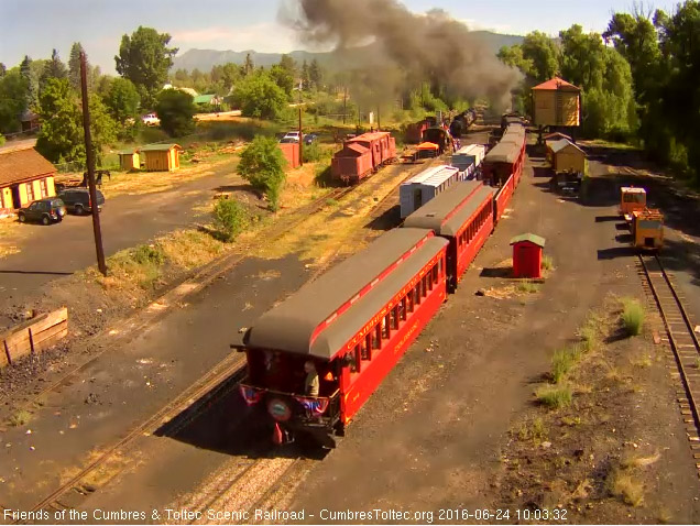 6.24.16 parlor Colorado has riders on the platform as it is by the coaling tower.jpg