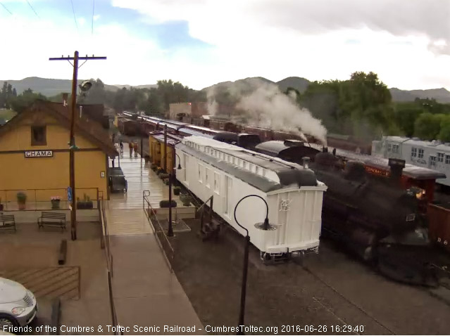 6.26.16 There is a hint of blue sky as 487 slows at the depot.jpg