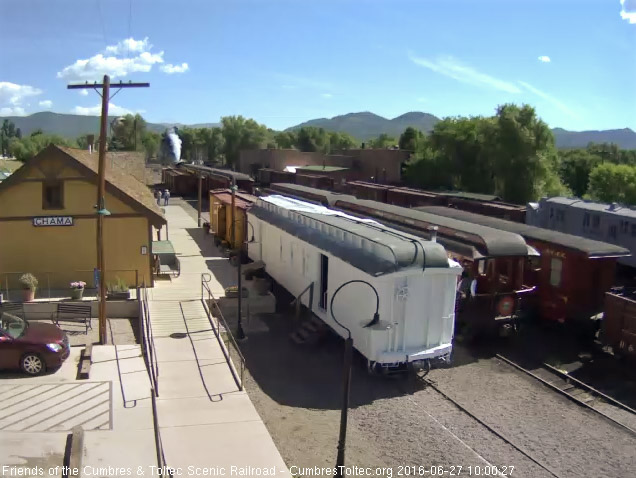 6.27.16 The conductor climbs aboard the New Mexico after giving the hi ball.jpg