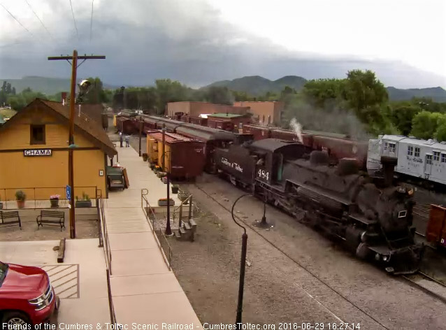 6.29.16 484 comes by the depot as the engineer awaits the signal to stop.jpg