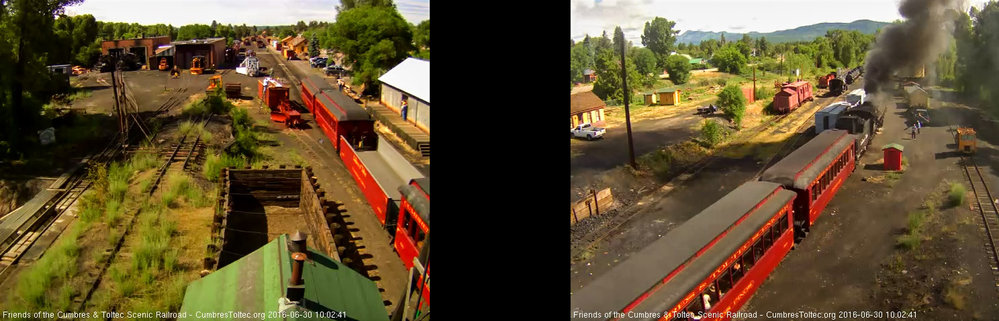 6.30.16 487 passes a couple of fans as it moves through north yard.jpg