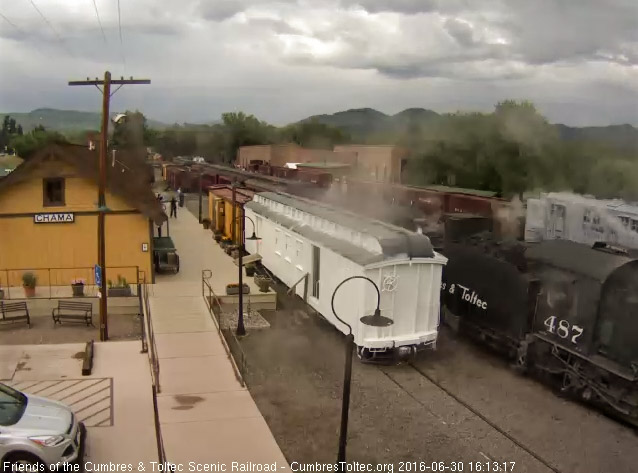 6.30.16 Steam condenses in the damp air as 487 passes the depot.jpg