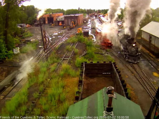 7.2.16 489 and 487 get a 10 car 216 underway in the rain.jpg