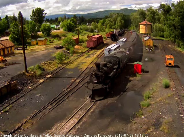 7.2.16 487 brings an 8 car 215 into Chama with the sun shinning.jpg
