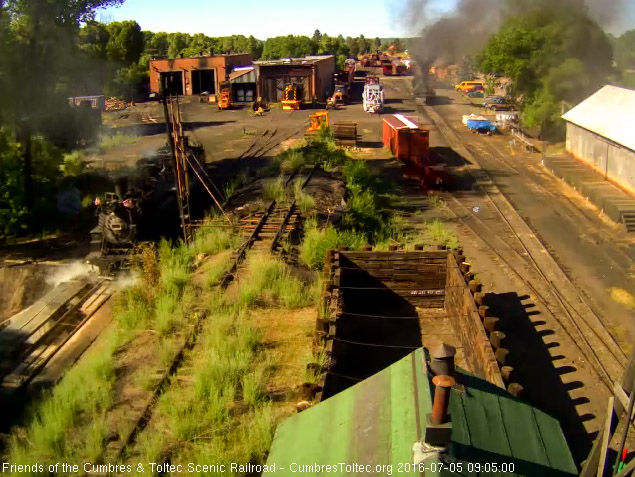 7.5.16 484 heads back to the house after cleaning and watering.jpg