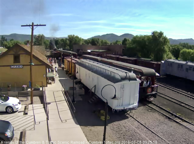 7.8.16 Train 216 is now in load position and the parlor host is standing on the platform in her white apron.jpg