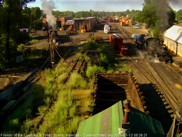 7.13.16 484 is now backing out of the coal lead as 487 backs toward the west side of the house.jpg
