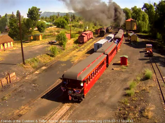 7.13.16 The conductor is standing on the platform of the Colorado as it moves out of Chama.jpg