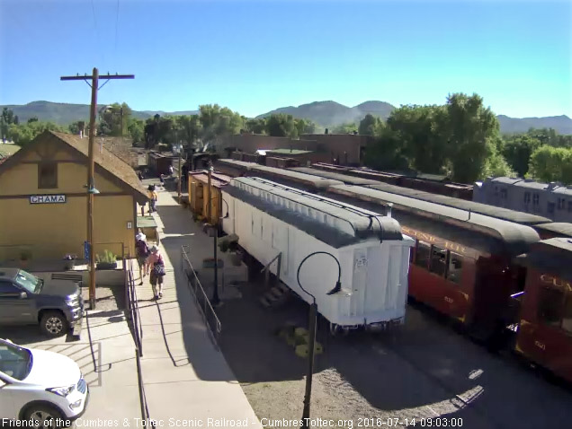 7.14.16 489 backs onto train 216 as Cinder Bear walks the depot platform.jpg