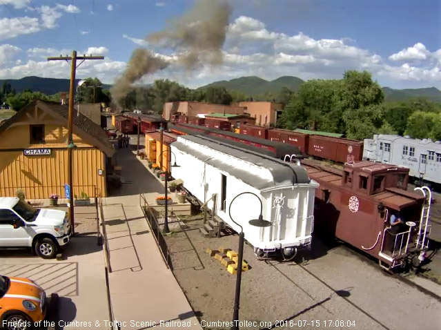 7.15.16 236 is off with the conductor on the caboose platform.jpg