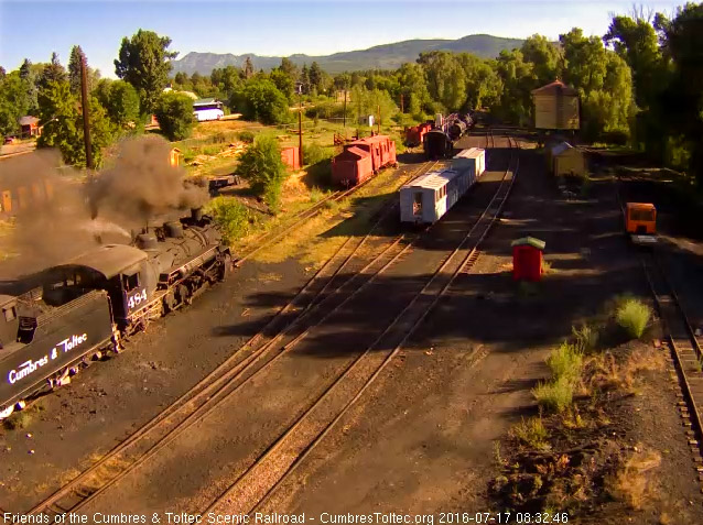 7.17.16 484 is at the coal dock as the bus to Antonito passes in the background on Rt. 17.jpg